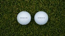 A picture of the Titleist Pro V1 and Pro V1x on grass