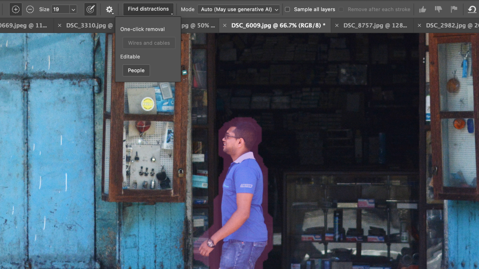 Screenshot showing the Distraction Removal tool in Adobe Photoshop