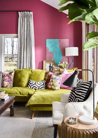 Pink living room with green sofa by Theresa Butler Interiors