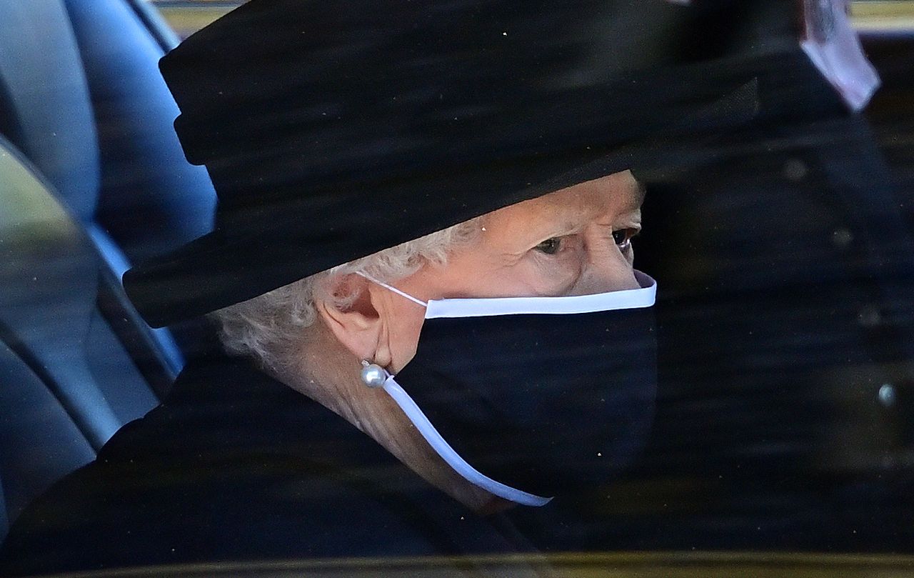 WINDSOR, UNITED KINGDOM - APRIL 17: (EMBARGOED FOR PUBLICATION IN UK NEWSPAPERS UNTIL 24 HOURS AFTER CREATE DATE AND TIME) Queen Elizabeth II travels (in her Bentley State Limousine) to attend the funeral of Prince Philip, Duke of Edinburgh at St. George&#039;s Chapel, Windsor Castle on April 17, 2021 in Windsor, England. Prince Philip of Greece and Denmark was born 10 June 1921, in Greece. He served in the British Royal Navy and fought in WWII. He married the then Princess Elizabeth on 20 November 1947 and was created Duke of Edinburgh, Earl of Merioneth, and Baron Greenwich by King VI. He served as Prince Consort to Queen Elizabeth II until his death on April 9 2021, months short of his 100th birthday. His funeral takes place today at Windsor Castle with only 30 guests invited due to Coronavirus pandemic restrictions. (Photo by Pool/Max Mumby/Getty Images)