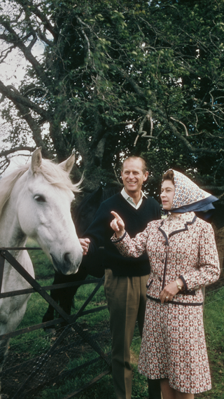 Queen Elizabeth II and Prince Philip visit a farm on the Balmoral estate in Scotland, during their Silver Wedding anniversary year, September 1972
