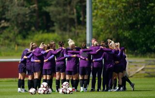 England's players in a huddle during a training session at St George’s Park