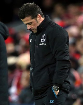 Marco Silva bows his head during Wednesday's defeat by Liverpool