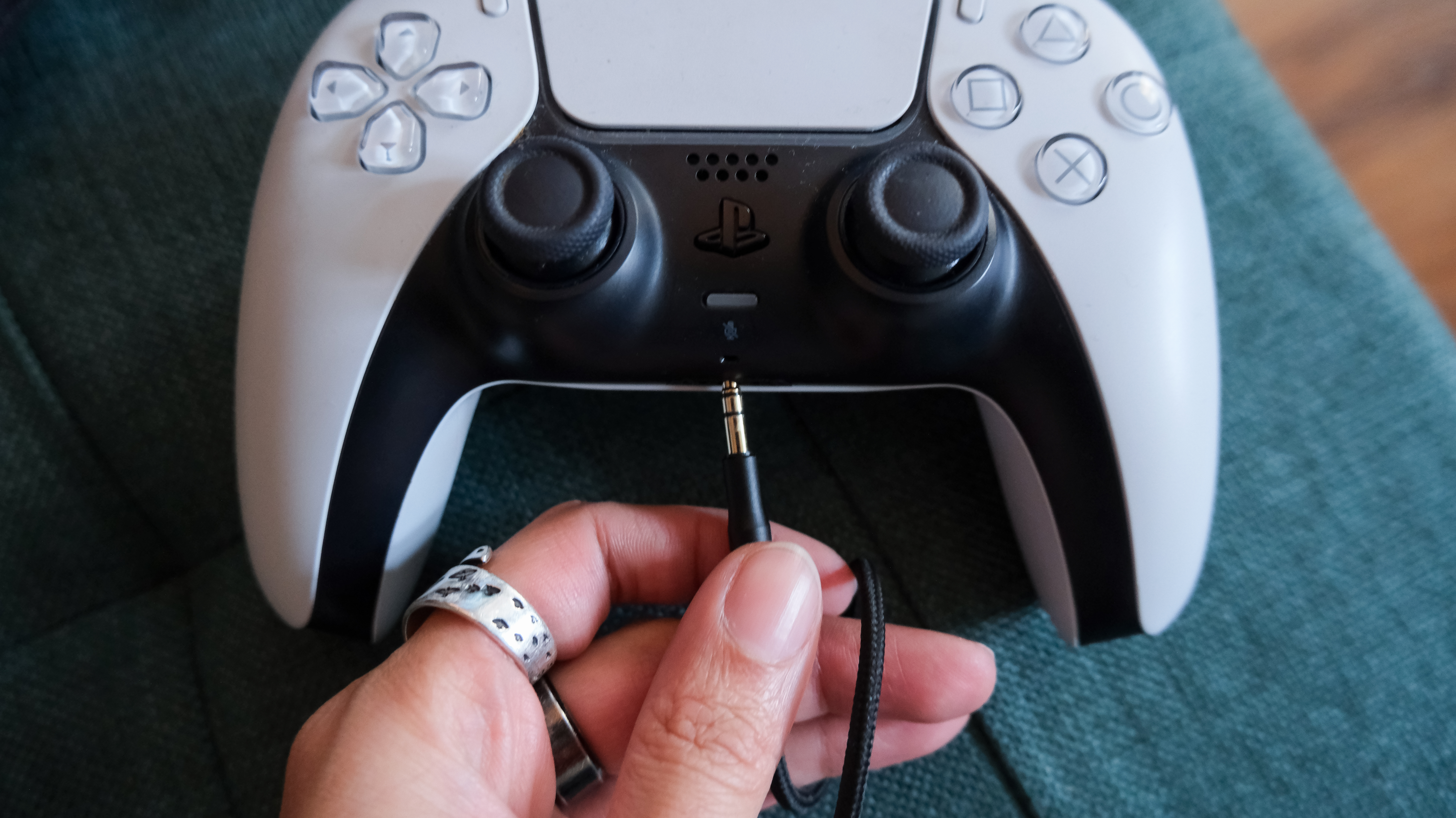 Meze 105 AER wired headphones being used with a PS5 Slim