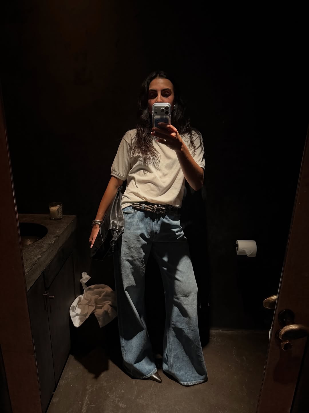 woman wearing heels with jeans spring outfit 2026