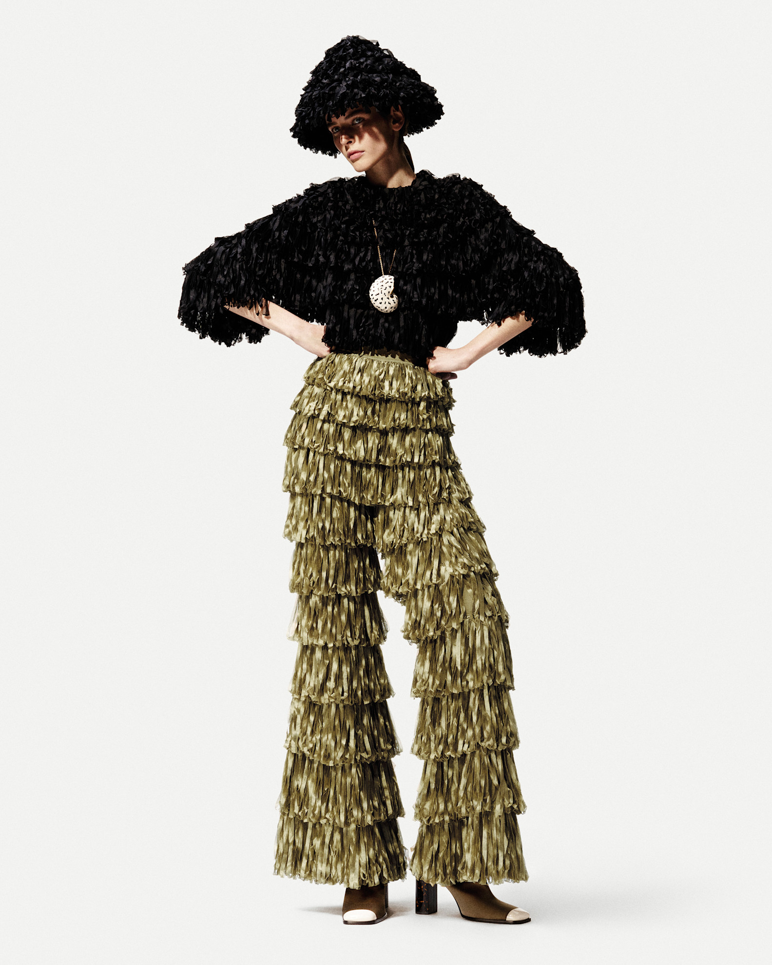 A model in the S/S 26 Loro Piana lookbook wearing dipped-toe shoes.