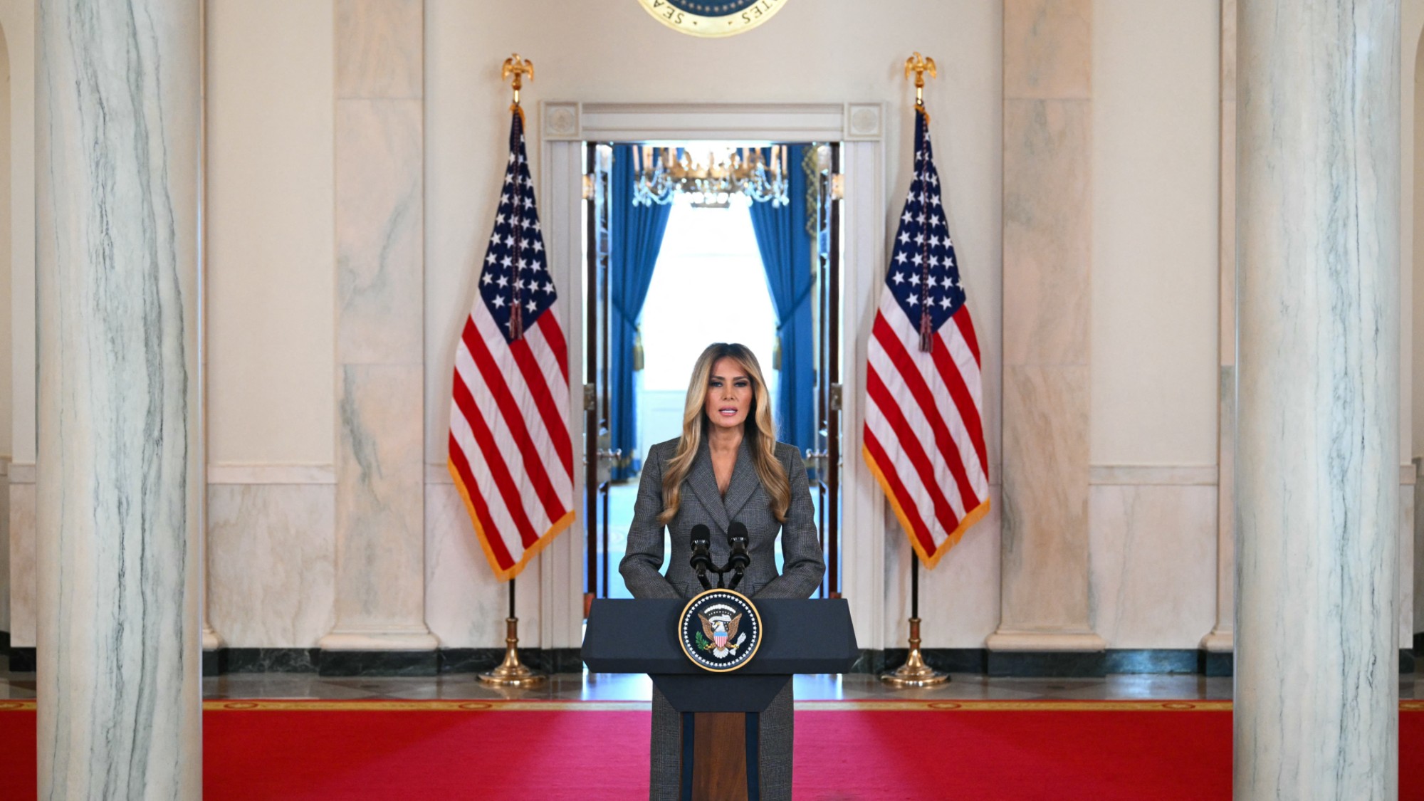 US First Lady Melania Trump speaks in the Cross Hall of the White House in Washington, DC, on April 9, 2026, denying any links to the late convicted sex offender Jeffrey Epstein and his abuse. US First Lady Melania Trump on April 9 made a surprise on-camera statement to deny unspecified allegations about her and convicted sex offender Jeffrey Epstein. "The lies linking me with the disgraceful Jeffrey Epstein need to end today," she said. "The individuals lying about me are devoid of ethical standards, humility and respect." (Photo by Mandel NGAN / AFP via Getty Images)