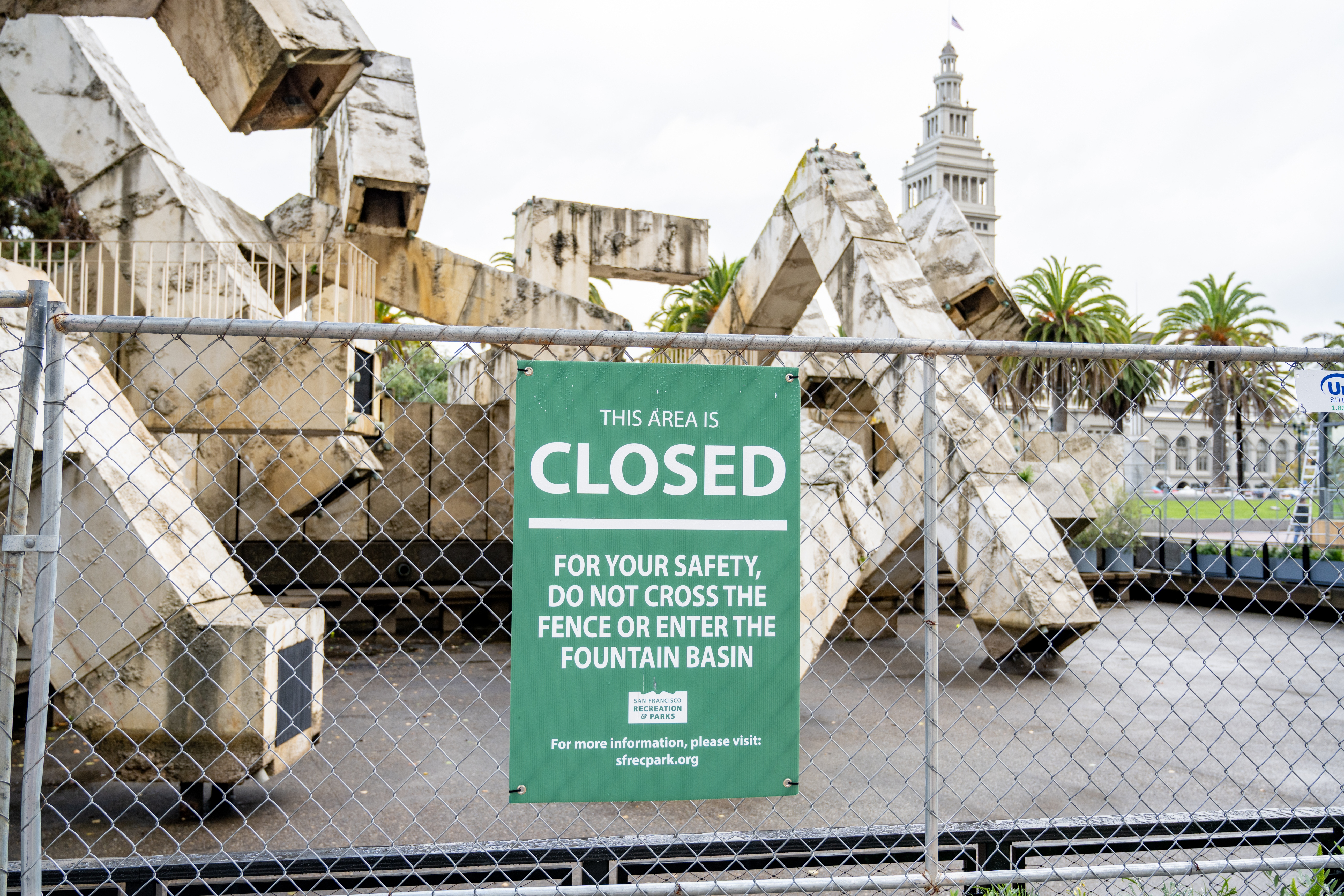 Vaillancourt Fountain with prominent Closed sign on construction fence, San Francisco, California, November 20, 2025