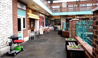 Weatherfield Precinct shops and entrance to flats