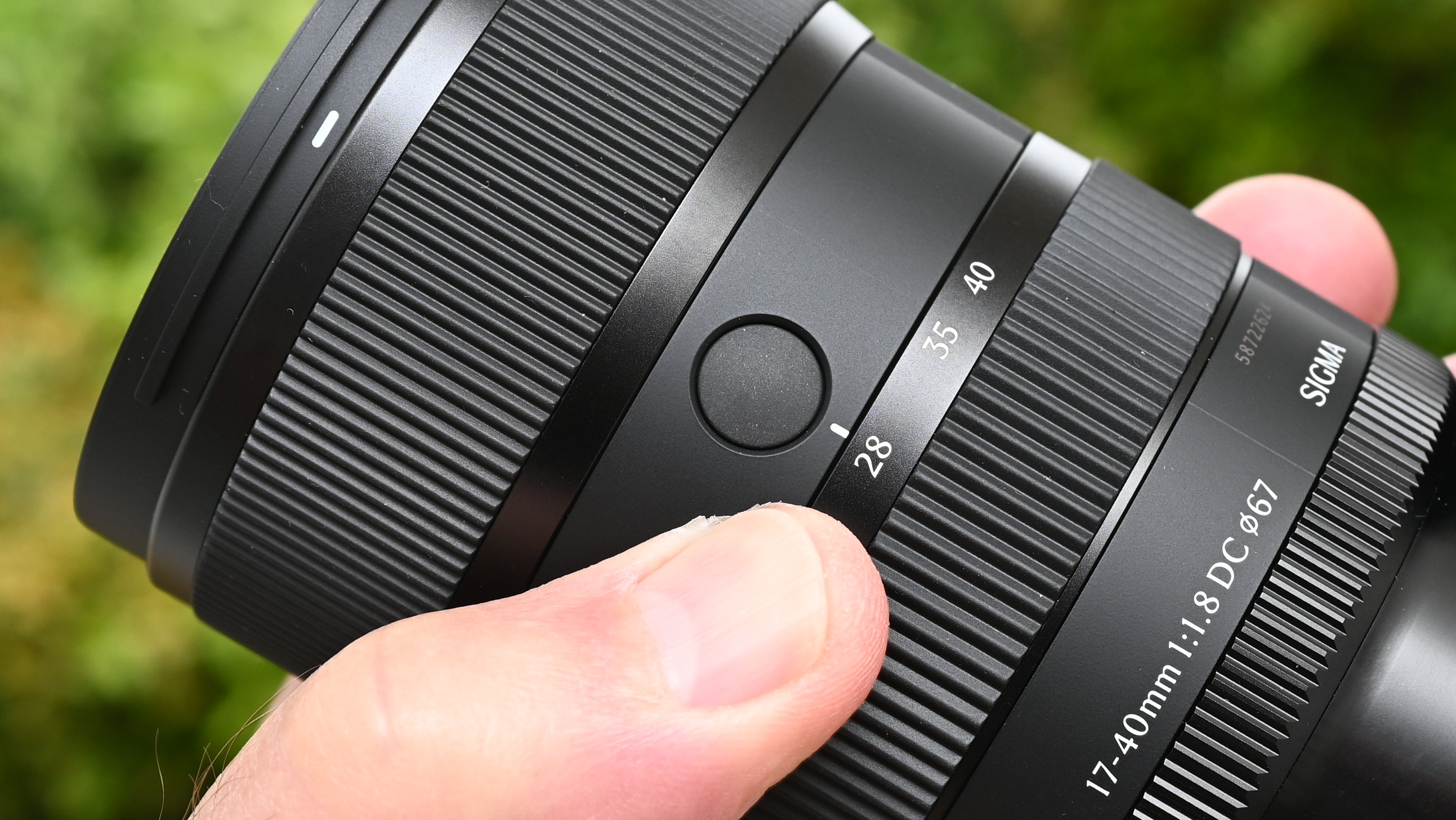 Sigma 17-40mm f/1.8 DC | A product shot held in hand