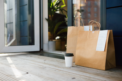 takeaway packages outside a front door, the safe way to have a takeaway during lockdown