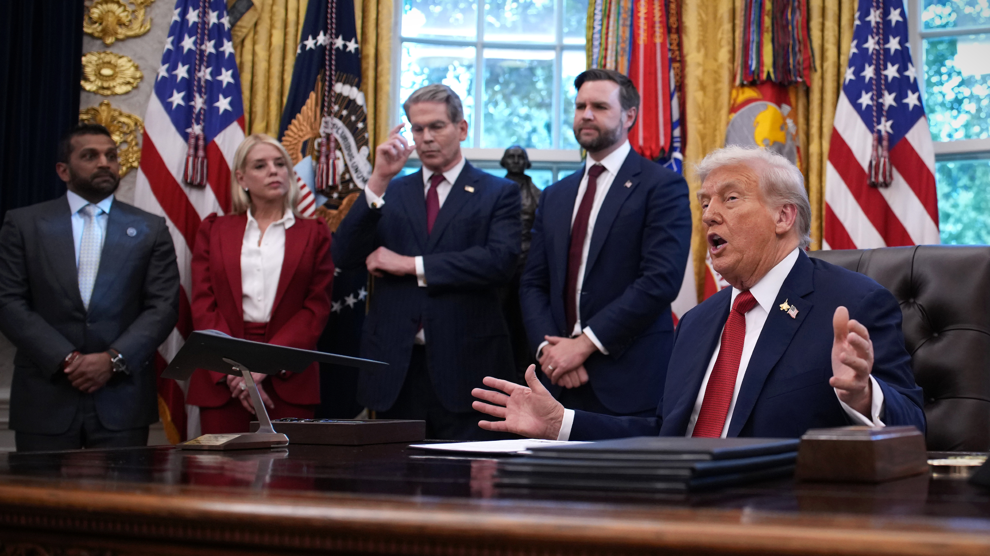President Donald Trump and Cabinet members in the Oval Office
