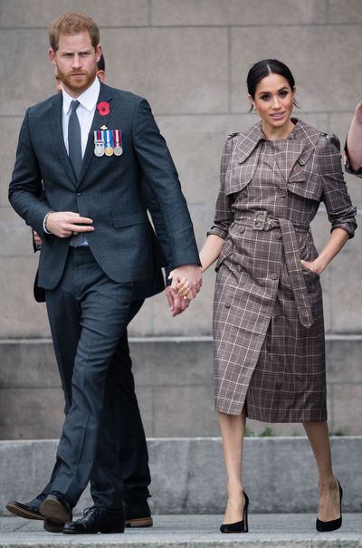 Clothing, Suit, Fashion, Standing, White-collar worker, Formal wear, Dress, Outerwear, Uniform, Footwear,