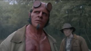 Jack Kesy staring upward as Hellboy in Hellboy: The Crooked Man