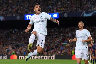 Inter Milan's Argentinian forward Lautaro Martinez celebrates scoring his team's second goal during the UEFA Champions League 1st round, group C, football match between FC Barcelona and Inter Milan at the Camp Nou stadium in Barcelona on October 12, 2022.