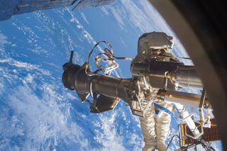Shkaplerov Spacewalk Outside ISS
