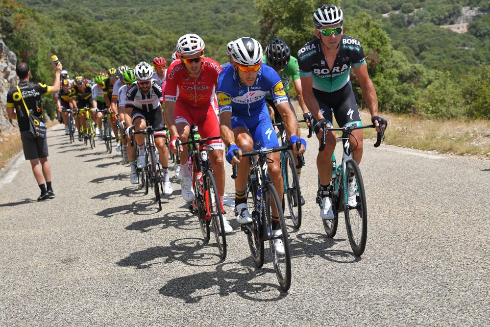 Philippe Gilbert leads the peloton during stage 14 at the Tour de France