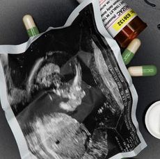 Baby scan and bottle of pills