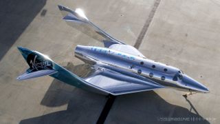 VSS Imagine shares the same basic body plan of Virgin Galactic's VSS Unity, a SpaceShipTwo vehicle. But the new space plane features some performance-enhancing upgrades and a mirror-like livery.