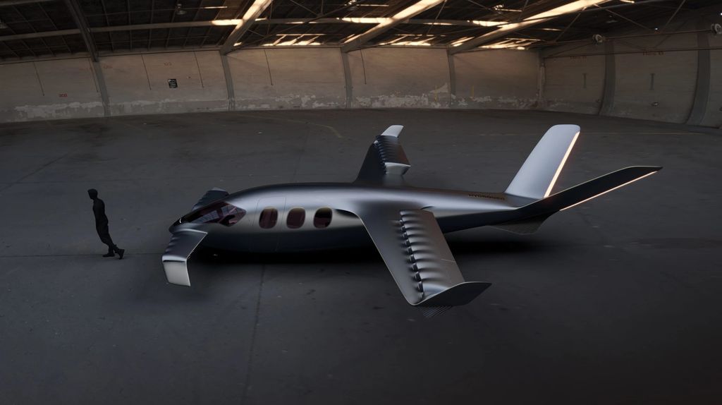 futuristic jet in concrete hangar