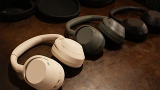 Three Sony ULT Wear headphones