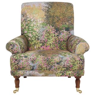 sofa chair with floral designed and wooden legs