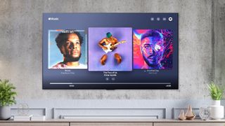 Apple music on smart TV on wall in living room