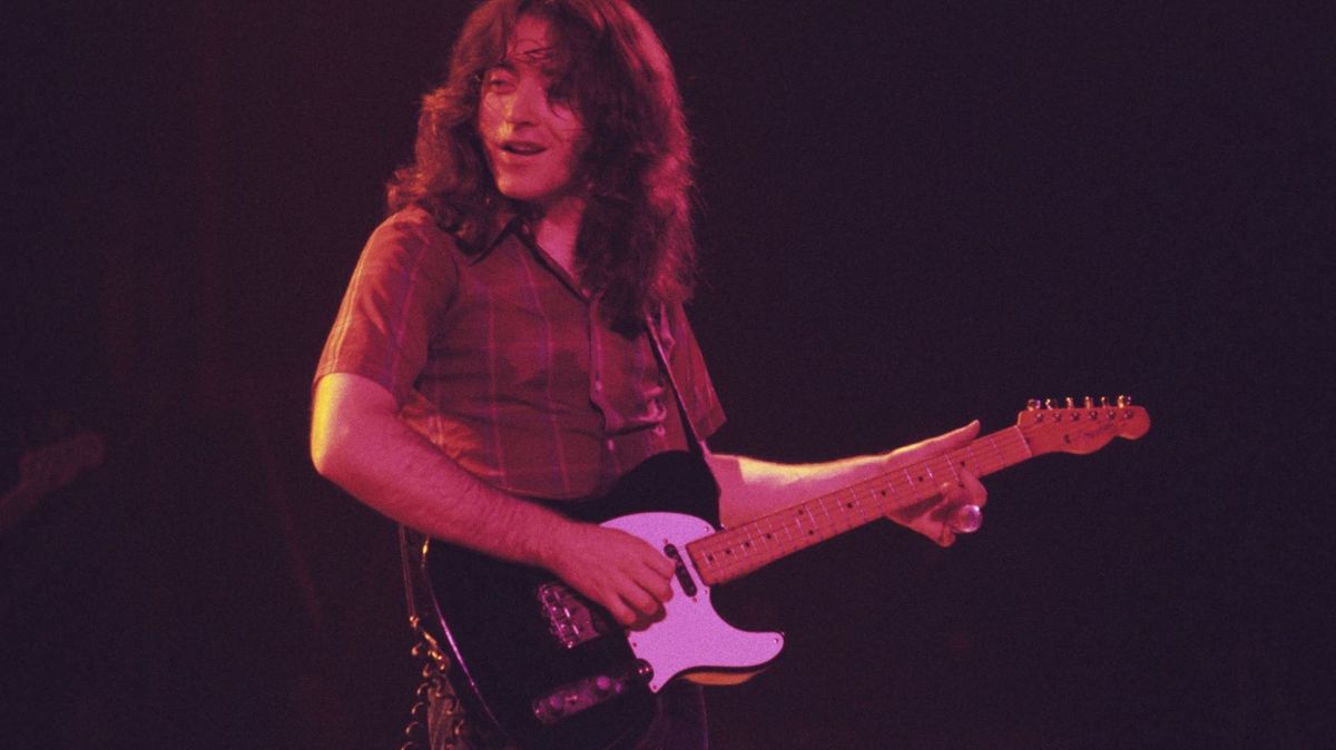 Rory Gallagher performs at the Omni Coliseum on February 8, 1976 in Atlanta, Georgia