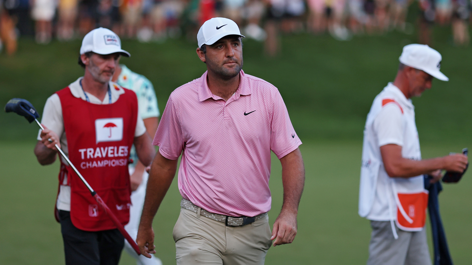 Scottie Scheffler walks off the green