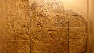 In this Assyrian relief, we see men on horses surrounding a city
