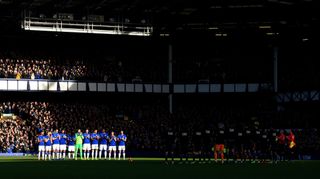 Players from Everton and Leicester take part in a minute's applause