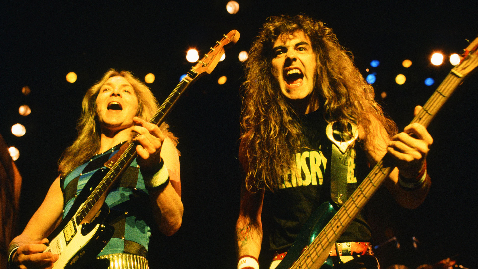 Dave Murray and Steve Harris performing on stage at Nakano Sunplaza Hall, Tokyo, Japan on April 14, 1985