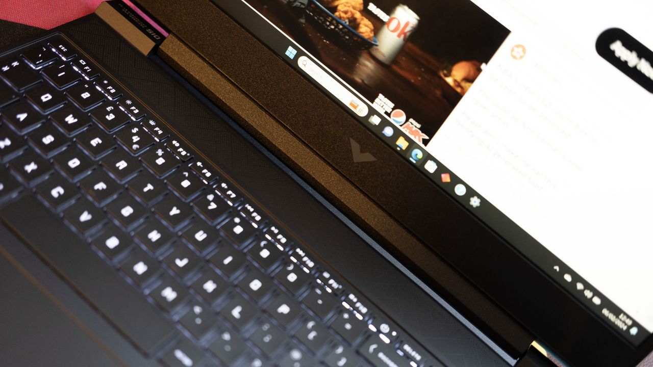 An HP Victus 15 laptop on a colourful table