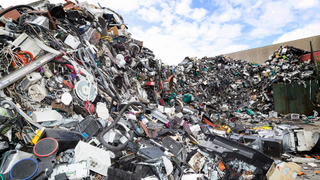 A trash heap of electronic items