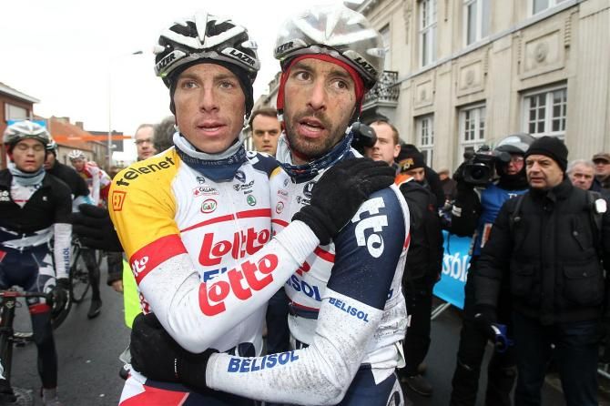 Lotto Belisol's Jonas Van Genechten, left, congratulates race winner Kenny Dehaes.