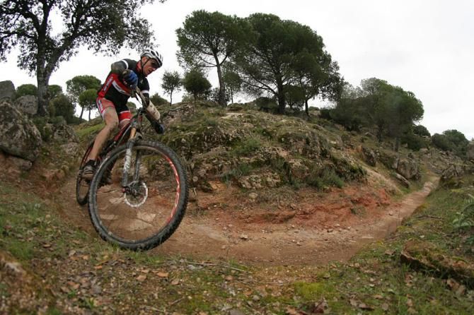 A rider rounds a bend