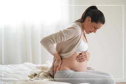 Woman experiencing contractions in pregnancy