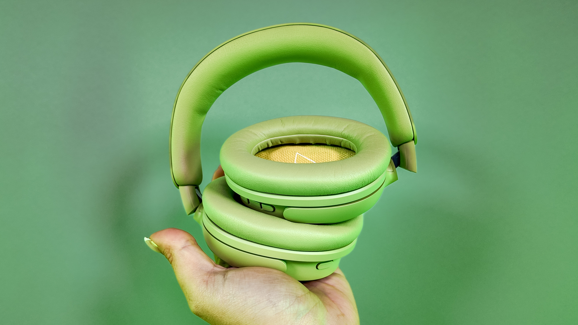 Bose QuietComfort Headphones (2nd Gen) held in a hand