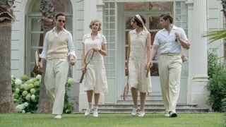 Harry Hadden-Paton, Laura Carmichael, Tuppence Middleton, and Allen Leech walking with tennis gear in Downton Abbey A New Era.