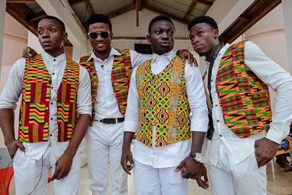 Choir members from the Arena of Love Church pose for a photo after Sunday service in Kumasi, Ghana.