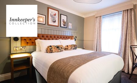 Innkeepers collection logo top left with a picture of a double bedroom suite
