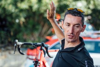 Marco Pinotti briefs BMC riders on the final training ride before the start of the 2018 Vuelta a Espana.