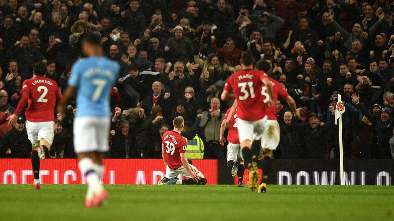 Man United fans and players celebrate Scott McTominay&amp;#039;s goal against Man City