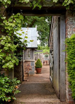 Path to the potting shed Photograph: Paul Highnam/Country Life Picture Library