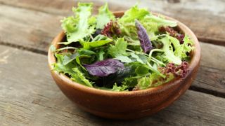 Fresh lettuce leaves in a bowl
