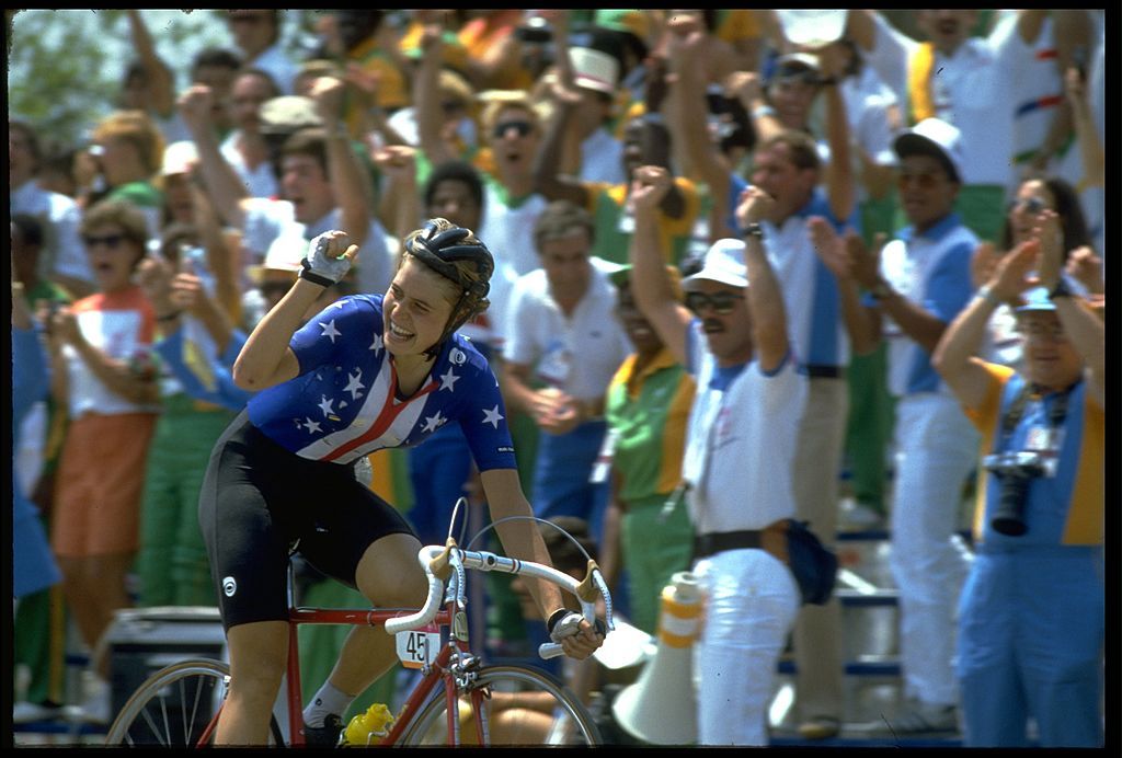 29 JUL 1984 REBECCA TWIGG OF THE UNITED STATES RAISES HER HAND IN VICTORY AFTER FINISHING THE WOMENs CYCLING ROAD RACE WITH A SILVER MEDAL AT THE 1984 LOS ANGELES OLYMPICS TWIGG FINISHED WITH A TIME OF 21114