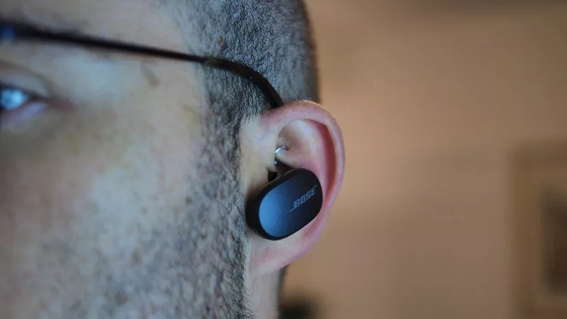 Bose Noise Canceling Earbuds in ear.