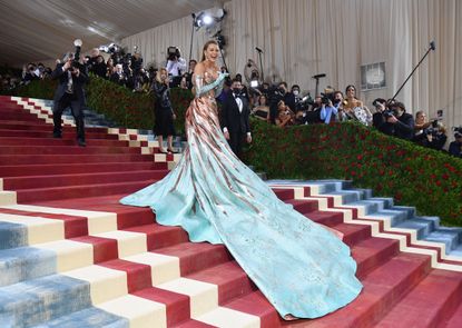 US actress Blake Lively arrives for the 2022 Met Gala at the Metropolitan Museum of Art on May 2, 2022, in New York. - The Gala raises money for the Metropolitan Museum of Art's Costume Institute. The Gala's 2022 theme is "In America: An Anthology of Fashion". (Photo by Angela Weiss / AFP) (Photo by ANGELA WEISS/AFP via Getty Images)