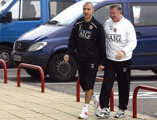 Swedish footballer Henrik Larsson (L) arrives for a press conference with Manchester United manager Alex Ferguson at the Carrington training ground in Manchester, north-west England, 20 December 2006. Larsson has joined the club on loan from Helsinborgs and will spend two-and-a-half months at United and will be eligible to make his debut 01 January 2007 in the English Premiership game against Newcastle. AFP PHOTO/PAUL ELLIS (Photo credit should read PAUL ELLIS/AFP via Getty Images)