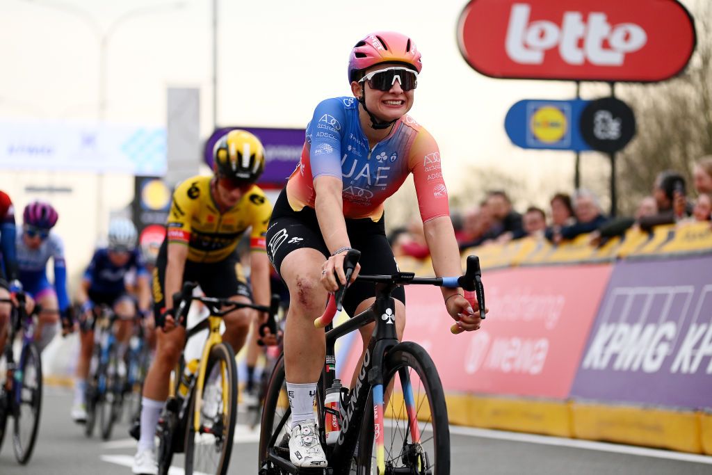 WAREGEM BELGIUM MARCH 29 Chiara Consonni of Italy and UAE Team Adq celebrates at finish line as second place winner during the 11th Dwars door Vlaanderen 2023 Womens Elite a 1149km ine day race from Waregem to Waregem DDV23 on March 29 2023 in Waregem Belgium Photo by Tim de WaeleGetty Images